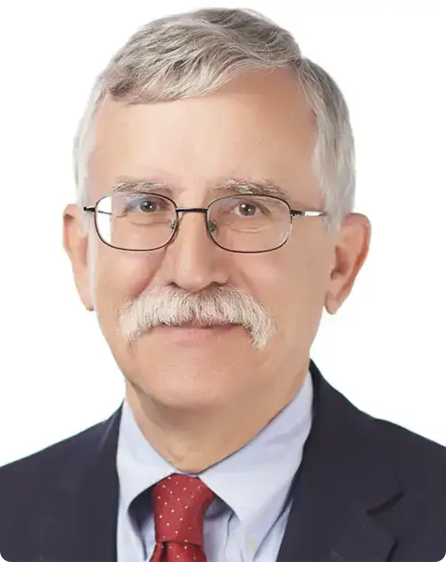 Portrait of David C. John against a white background